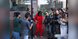 A assassina confessa Paola Stefany Neto Cirino na saída do prédio no São Pedro, em Belo Horizonte - Foto: Flavio Tavares / O TEMPO